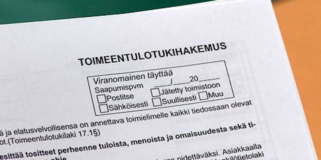 Toimeentulotukihakemuksen yläkulma. Kuvituskuva.