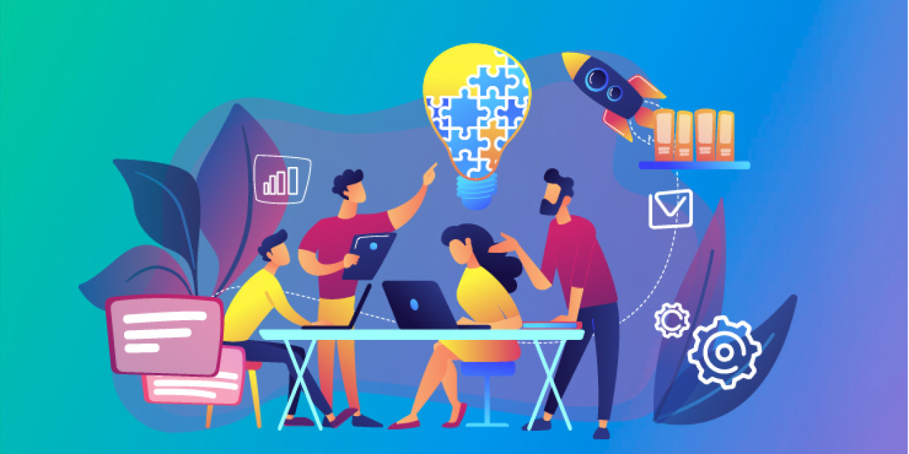 Kuvituskuvassa neljä ihmistä pöydän ääressä tekemässä ryhmätöitä