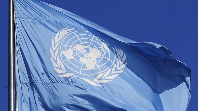 YK:n lippu salossa. Kuvituskuva.