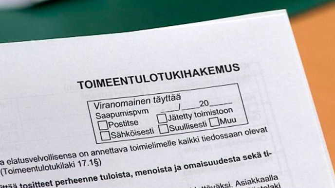 Toimeentulotukihakemuksen yläkulma. Kuvituskuva.